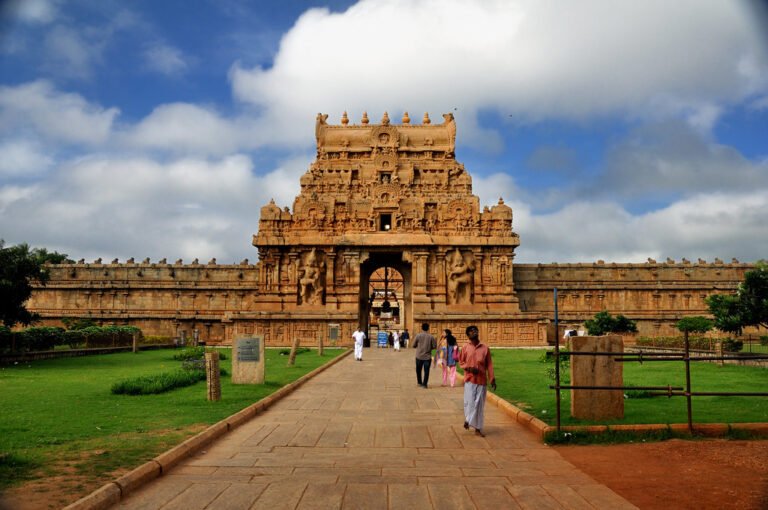 A towering carved gateway of an ancient stone temple