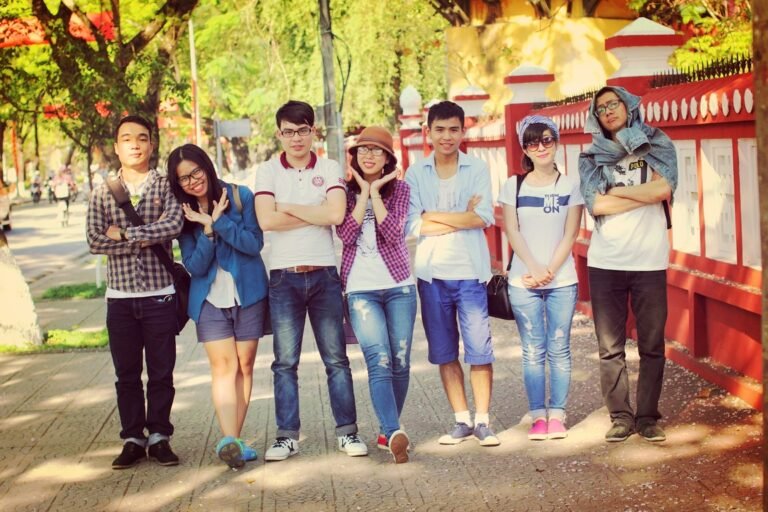 A group of young friends smiling and posing together during a trip